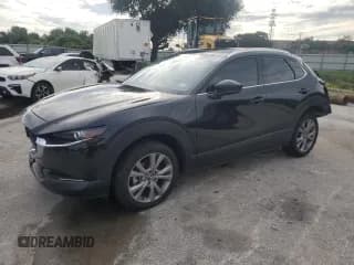 ✅ 2022 Mazda CX-30 S Premium • VIN: 3MVDMBDL4NM434429 • Лот: 72082915. Опубликован ранее на Copart с пробегом 41 606 миль. Бесплатный доступ к архиву аукционных продаж из США и подробный отчёт об истории автомобиля на DreamBid. Изображение 1.