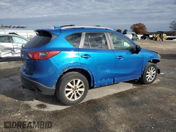 ✅ 2014 Mazda CX-5 Touring • VIN: JM3KE4CYXE0371278 • Lot: 90450645. Listed on Copart with 212,570 mi. Free auction sales archive from the USA and detailed vehicle history report at DreamBid. Image 3.