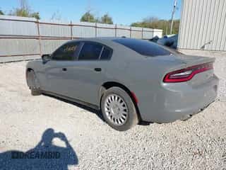 2018 Dodge Charger Police z VIN 2C3CDXKT8JH170707, wystawiony jako IAAI lot #43461218 z przebiegiem 160 301 mil mil oraz . Historia ofert i sprzedaży dostępna na DreamBid. Obrazek 3.