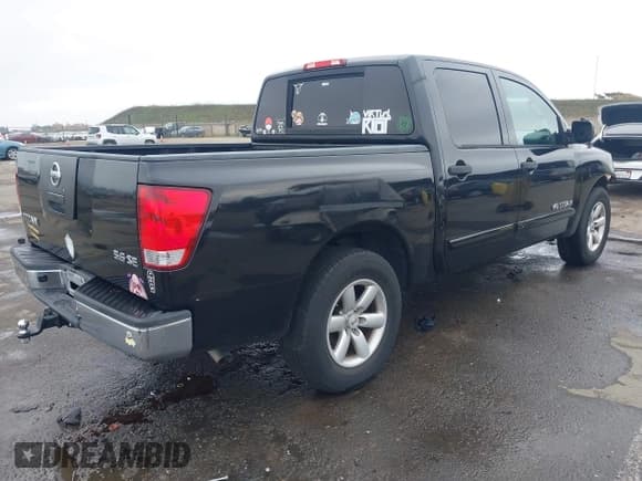 ✅ 2008 Nissan Titan SE • VIN: 1N6AA07D08N328668 • Lot: 43787388. Listed on IAAI with 128,283 mi. Free auction sales archive from the USA and detailed vehicle history report at DreamBid. Image 4.
