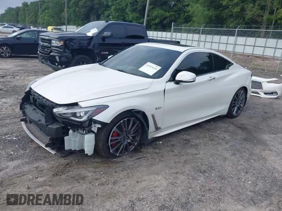 ✅ 2017 Infiniti Q60 Red Sport 400 • VIN: JN1FV7EK1HM610415 • Lot: 42493610. Listed on IAAI with 107,122 mi. Free auction sales archive from the USA and detailed vehicle history report at DreamBid. Image 2.