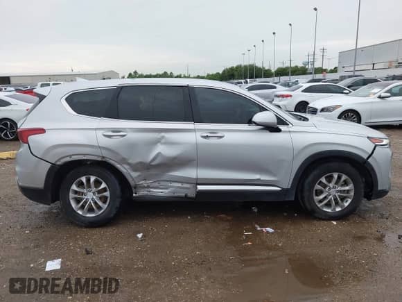 2019 Hyundai Santa Fe SEL Plus z VIN 5NMS33AD3KH130800, wystawiony jako IAAI lot #42666362 z przebiegiem 102 952 mil mil oraz . Historia ofert i sprzedaży dostępna na DreamBid. Obrazek 13.