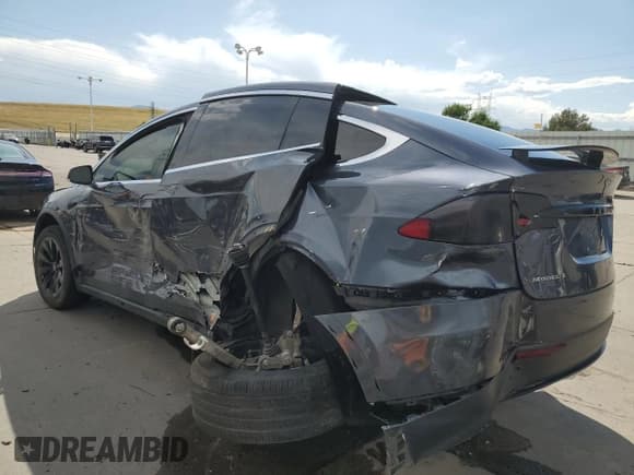 ✅ 2018 Tesla Model X 75D • VIN: 5YJXCAE28JF103725 • Лот: 63797385. Опубликован ранее на Copart с пробегом 148 943 миль. Бесплатный доступ к архиву аукционных продаж из США и подробный отчёт об истории автомобиля на DreamBid. Изображение 2.