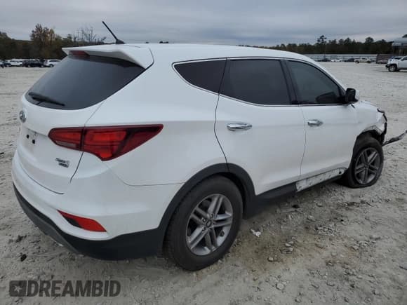 ✅ 2018 Hyundai Santa Fe 2.4L • VIN: 5NMZTDLB7JH098996 • Лот: 64157592. Опубликован ранее на Copart с пробегом 94 097 миль. Бесплатный доступ к архиву аукционных продаж из США и подробный отчёт об истории автомобиля на DreamBid. Изображение 4.