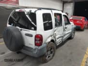 ✅ 2005 Jeep Liberty Sport • VIN: 1J4GL48KX5W545821 • Lot: 43747043. Listed on IAAI with 171,457 mi. Free auction sales archive from the USA and detailed vehicle history report at DreamBid. Image 4.