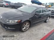 ✅ 2014 Volkswagen CC Executive • VIN: WVWRP7AN3EE537770 • Lot: 41385247. Listed on IAAI with 135,069 mi. Free auction sales archive from the USA and detailed vehicle history report at DreamBid. Image 2.
