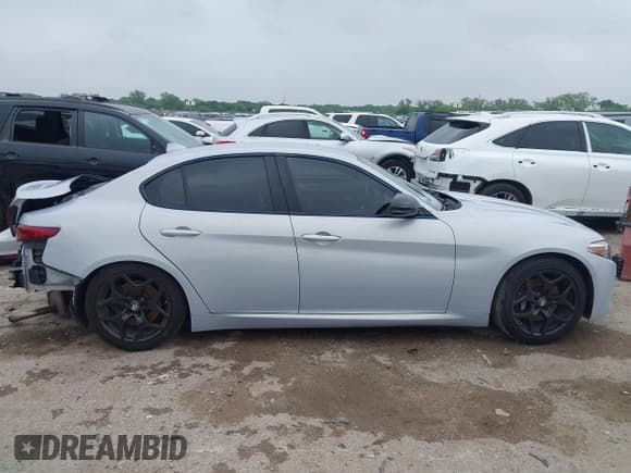 ✅ 2021 Alfa Romeo Giulia • VIN: ZARFAMAN6M7645490 • Lot: 42165037. Listed on IAAI with 57,701 mi. Free auction sales archive from the USA and detailed vehicle history report at DreamBid. Image 13.