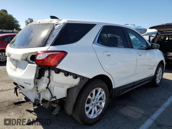 ✅ 2021 Chevrolet Equinox LT • VIN: 3GNAXTEV0MS132218 • Лот: 85869475. Опубликован ранее на Copart с пробегом 64 241 миль. Бесплатный доступ к архиву аукционных продаж из США и подробный отчёт об истории автомобиля на DreamBid. Изображение 3.