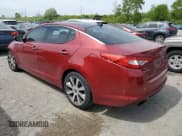 ✅ 2012 Kia Optima SX • VIN: 5XXGR4A64CG070859 • Лот: 67184165. Опубликован ранее на Copart с пробегом 170 772 миль. Бесплатный доступ к архиву аукционных продаж из США и подробный отчёт об истории автомобиля на DreamBid. Изображение 2.