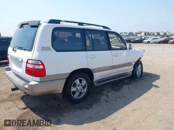 ✅ 2003 Toyota Land Cruiser • VIN: JTEHT05J732046635 • Lot: 42999962. Listed on IAAI with 263,143 mi. Free auction sales archive from the USA and detailed vehicle history report at DreamBid. Image 4.