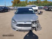 ✅ 2016 Ford Focus SE • VIN: 1FADP3F2XGL243059 • Lot: 43573859. Listed on IAAI with 104,132 mi. Free auction sales archive from the USA and detailed vehicle history report at DreamBid. Image 12.