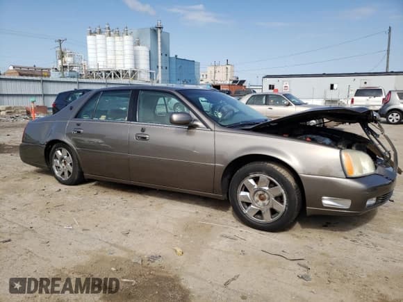✅ 2001 Cadillac DeVille DTS • VIN: 1G6KF57961U249148 • Lot: 73604474. Listed on Copart with 137,444 mi. Free auction sales archive from the USA and detailed vehicle history report at DreamBid. Image 4.