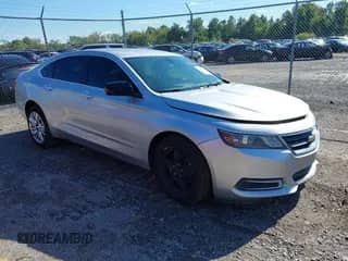 2014 Chevrolet Impala LS z VIN 1G11Y5SL0EU121735, wystawiony jako IAAI lot #43403934 z przebiegiem 157 328 mil mil oraz . Historia ofert i sprzedaży dostępna na DreamBid. Obrazek 1.