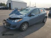 ✅ 2014 Mazda 2 Sport • VIN: JM1DE1KZ6E0179933 • Lot: 72093095. Listed on Copart with 110,288 mi. Free auction sales archive from the USA and detailed vehicle history report at DreamBid. Image 1.