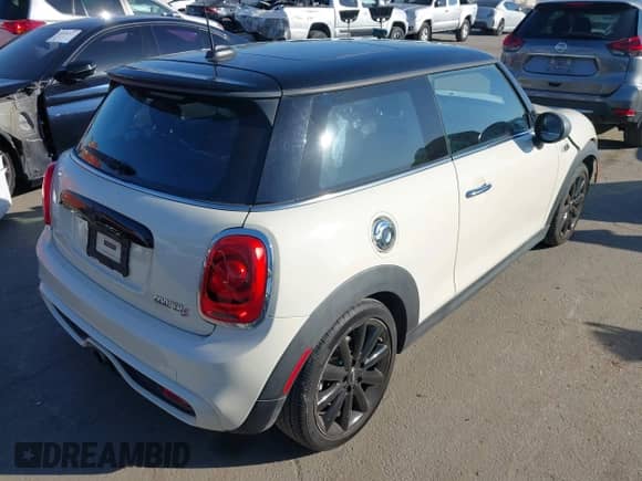 2017 MINI Hardtop Cooper S with VIN WMWXP7C57H3B93462, listed as a IAAI auction lot 43517920 with 56,050 mi miles and . Bid and sale history available at DreamBid. Image 4.