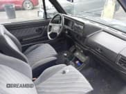 ✅ 1989 Volkswagen Cabriolet • VIN: WVWCA0153KKO31318 • Lot: 43657545. Listed on IAAI with 138,095 mi. Free auction sales archive from the USA and detailed vehicle history report at DreamBid. Image 5.