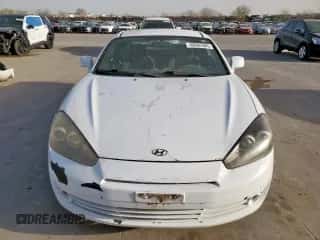 2007 Hyundai Tiburon GS с VIN KMHHM66D27U260421, выставлен на аукционе Copart как лот 48982505 с пробегом 100 045 миль миль и Чистый • Clean title. История ставок и продаж доступна на DreamBid. Изображение 5.