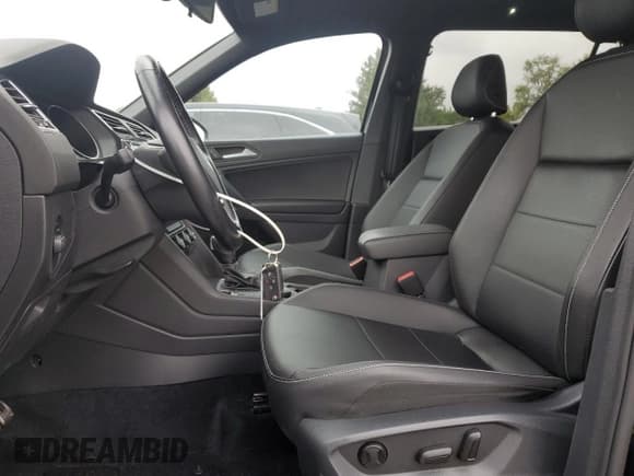 ✅ 2021 Volkswagen Tiguan SE • VIN: 3VV2B7AX1MM067735 • Lot: 86079125. Listed on Copart with 83,584 mi. Free auction sales archive from the USA and detailed vehicle history report at DreamBid. Image 7.