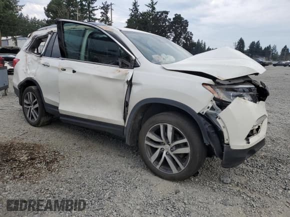 ✅ 2018 Honda Pilot Touring • VIN: 5FNYF6H91JB018033 • Lot: 70367585. Listed on Copart with Not provided. Free auction sales archive from the USA and detailed vehicle history report at DreamBid. Image 4.