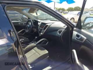 2015 Hyundai Veloster with VIN KMHTC6AD6FU229384, listed as a IAAI auction lot 43347439 with 144,004 mi miles and . Bid and sale history available at DreamBid. Image 5.