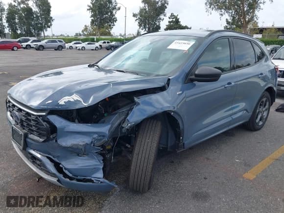 ✅ 2024 Ford Escape ST-Line • VIN: 1FMCU0MZ8RUB23637 • Lot: 43423036. Listed on IAAI with 12,089 mi. Free auction sales archive from the USA and detailed vehicle history report at DreamBid. Image 2.