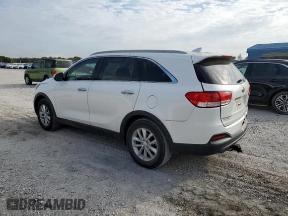 ✅ 2016 Kia Sorento LX • VIN: 5XYPG4A51GG011749 • Lot: 85252535. Listed on Copart with 126,686 mi. Free auction sales archive from the USA and detailed vehicle history report at DreamBid. Image 2.