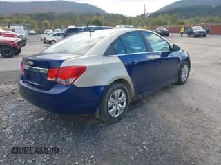 ✅ 2014 Chevrolet Cruze LS • VIN: 1G1PA5SG0E7190408 • Lot: 43389511. Wystawiony na IAAI z przebiegiem 158 021 mil. Bezpłatny archiwum sprzedaży aukcyjnych z USA i szczegółowy raport historii pojazdu na DreamBid. Zdjęcie 4.