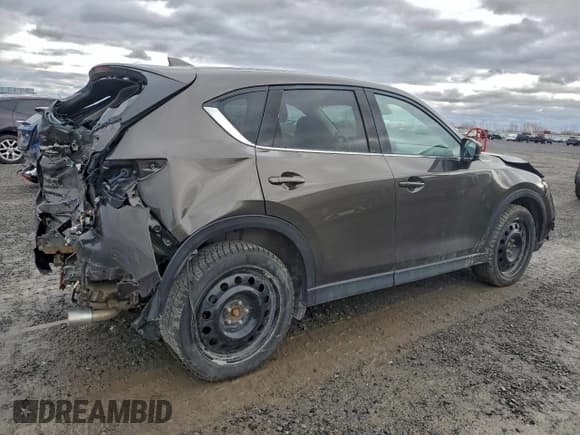 ✅ 2019 Mazda CX-5 Grand Touring • VIN: JM3KFBDMXK0630022 • Лот: 94951835. Опубликован ранее на Copart с пробегом 128 358 миль. Бесплатный доступ к архиву аукционных продаж из США и подробный отчёт об истории автомобиля на DreamBid. Изображение 3.