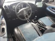 ✅ 1998 Mitsubishi Mirage LS • VIN: JA3AY31C7WU002612 • Lot: 86883254. Listed on Copart with Not provided. Free auction sales archive from the USA and detailed vehicle history report at DreamBid. Image 8.