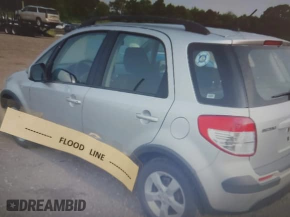 ✅ 2011 Suzuki SX4 Crossover • VIN: JS2YB5A36B6303423 • Lot: 42915401. Listed on IAAI with 48,824 mi. Free auction sales archive from the USA and detailed vehicle history report at DreamBid. Image 6.