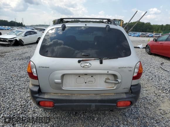✅ 2002 Hyundai Santa Fe GLS • VIN: KM8SC73D12U247042 • Лот: 80391225. Опубликован ранее на Copart с пробегом 297 628 миль. Бесплатный доступ к архиву аукционных продаж из США и подробный отчёт об истории автомобиля на DreamBid. Изображение 6.