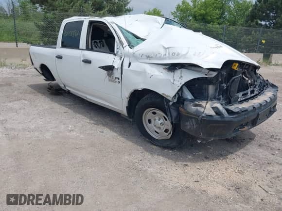 2014 Ram 1500 Tradesman with VIN 1C6RR7KGXES324124, listed as a IAAI auction lot 42455561 with 94,176 mi miles and . Bid and sale history available at DreamBid. Image 1.