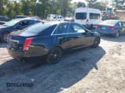 ✅ 2014 Cadillac CTS Luxury AWD • VIN: 1G6AX5S39E0120197 • Lot: 43083515. Wystawiony na IAAI z przebiegiem 140 823 mil. Bezpłatny archiwum sprzedaży aukcyjnych z USA i szczegółowy raport historii pojazdu na DreamBid. Zdjęcie 4.