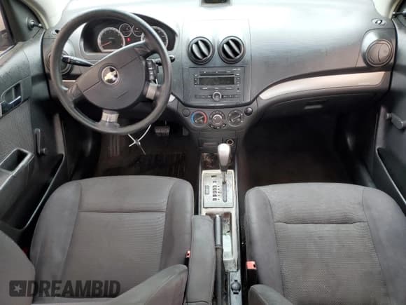 ✅ 2007 Chevrolet Aveo LS • VIN: KL1TD56617B044721 • Lot: 51772795. Wystawiony na Copart z przebiegiem 249 689 mil. Bezpłatny archiwum sprzedaży aukcyjnych z USA i szczegółowy raport historii pojazdu na DreamBid. Zdjęcie 8.