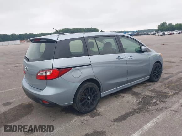 ✅ 2012 Mazda 5 Touring • VIN: JM1CW2CL7C0115096 • Lot: 42524956. Wystawiony na IAAI z przebiegiem 173 155 mil. Bezpłatny archiwum sprzedaży aukcyjnych z USA i szczegółowy raport historii pojazdu na DreamBid. Zdjęcie 4.