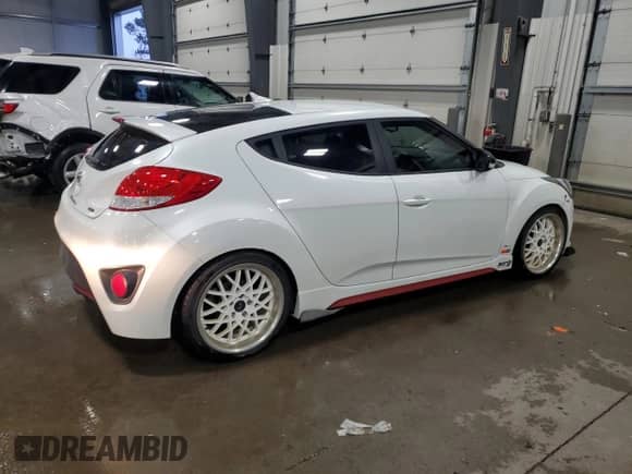 2016 Hyundai Veloster Turbo z VIN KMHTC6AE8GU265894, wystawiony jako Copart lot #85660694 z przebiegiem 117 445 mil mil oraz Szkoda całkowita • Salvage title. Historia ofert i sprzedaży dostępna na DreamBid. Obrazek 3.