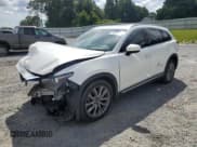 ✅ 2021 Mazda CX-9 Grand Touring • VIN: JM3TCADYXM0500173 • Lot: 71232315. Listed on Copart with 86,722 mi. Free auction sales archive from the USA and detailed vehicle history report at DreamBid. Image 1.