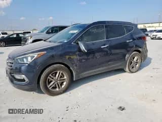 2018 Hyundai Santa Fe 2.4L с VIN 5NMZU3LB3JH072578, выставлен на аукционе Copart как лот 80745675 с пробегом 84 682 миль миль и Списание • Salvage title. История ставок и продаж доступна на DreamBid. Изображение 1.