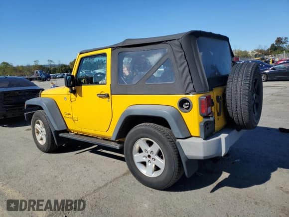 ✅ 2015 Jeep Wrangler Sport • VIN: 1C4AJWAG0FL592393 • Lot: 87080995. Wystawiony na Copart z przebiegiem 80 365 mil. Bezpłatny archiwum sprzedaży aukcyjnych z USA i szczegółowy raport historii pojazdu na DreamBid. Zdjęcie 2.