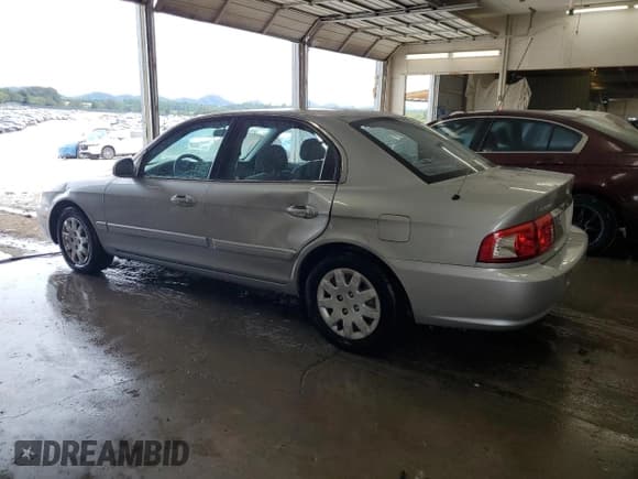 ✅ 2006 Kia Optima LX • VIN: KNAGD126665469273 • Lot: 70371855. Wystawiony na Copart z przebiegiem 238 021 mil. Bezpłatny archiwum sprzedaży aukcyjnych z USA i szczegółowy raport historii pojazdu na DreamBid. Zdjęcie 2.