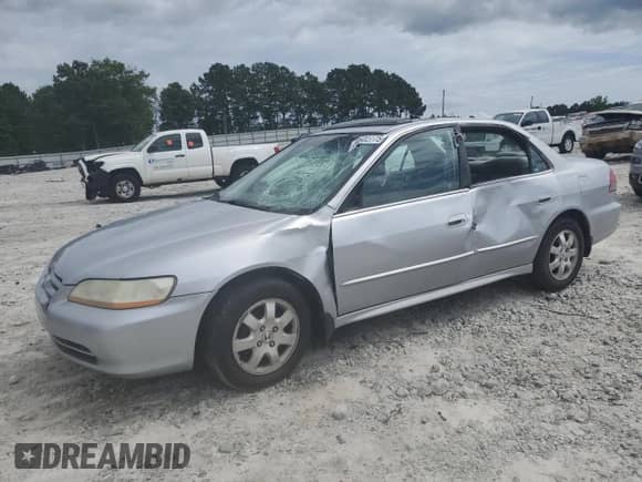 2001 Honda Accord EX с VIN 1HGCG56621A117576, выставлен на аукционе Copart как лот 59602775 с пробегом Не указан миль и Списание • Salvage title. История ставок и продаж доступна на DreamBid. Изображение 1.