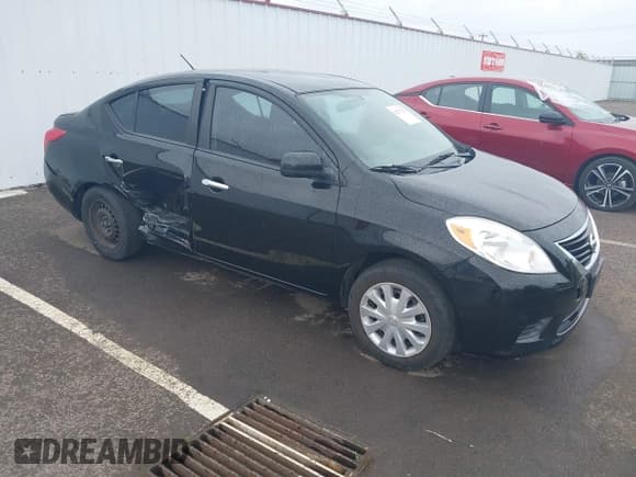 ✅ 2012 Nissan Versa SV • VIN: 3N1CN7AP1CL814932 • Lot: 42272722. Listed on IAAI with 137,349 mi. Free auction sales archive from the USA and detailed vehicle history report at DreamBid. Image 1.