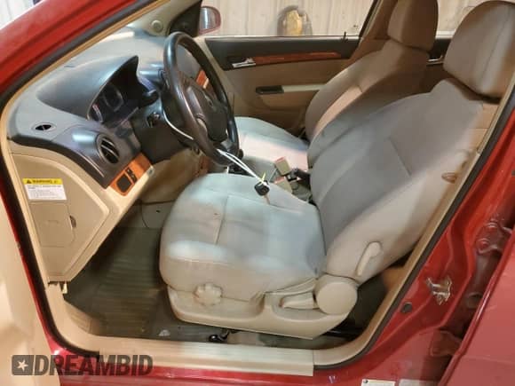 2009 Chevrolet Aveo 1LT z VIN KL1TD66E79B646149, wystawiony jako Copart lot #87581235 z przebiegiem 156 634 mil mil oraz Szkoda całkowita • Salvage title. Historia ofert i sprzedaży dostępna na DreamBid. Obrazek 7.