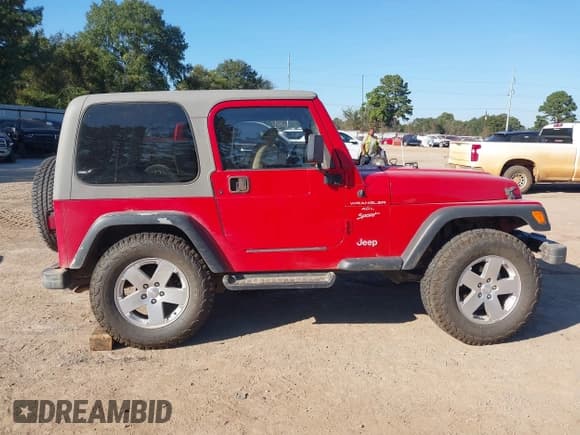 ✅ 2000 Jeep Wrangler Sport • VIN: 1J4FA49S8YP764016 • Лот: 43445934. Опубликован ранее на IAAI с пробегом 218 600 миль. Бесплатный доступ к архиву аукционных продаж из США и подробный отчёт об истории автомобиля на DreamBid. Изображение 14.
