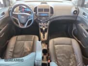 ✅ 2012 Chevrolet Sonic LTZ • VIN: 1G1JE6SH3C4167034 • Lot: 86705675. Listed on Copart with 105,702 mi. Free auction sales archive from the USA and detailed vehicle history report at DreamBid. Image 8.