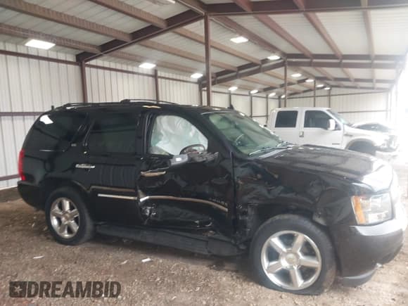 ✅ 2013 Chevrolet Tahoe LTZ • VIN: 1GNSCCE03DR122449 • Lot: 42860317. Listed on IAAI with 181,518 mi. Free auction sales archive from the USA and detailed vehicle history report at DreamBid. Image 13.
