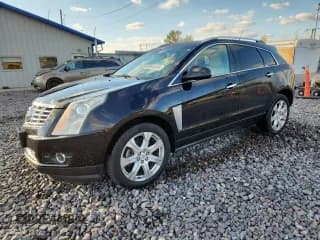 ✅ 2014 Cadillac SRX Performance Collection • VIN: 3GYFNCE36ES654429 • Lot: 90144925. Wystawiony na Copart z przebiegiem 182 516 mil. Bezpłatny archiwum sprzedaży aukcyjnych z USA i szczegółowy raport historii pojazdu na DreamBid. Zdjęcie 1.