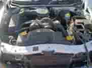 2000 Dodge Dakota z VIN 1B7GL22X2YS631036, wystawiony jako Copart lot #74635254 z przebiegiem 179 367 mil mil oraz Czysty tytuł • Clean title. Historia ofert i sprzedaży dostępna na DreamBid. Obrazek 11.