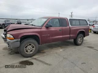✅ 2002 Dodge Dakota SLT • VIN: 1B7GG42N62S542723 • Lot: 50981195. Wystawiony na Copart z przebiegiem 215 594 mil. Bezpłatny archiwum sprzedaży aukcyjnych z USA i szczegółowy raport historii pojazdu na DreamBid. Zdjęcie 1.