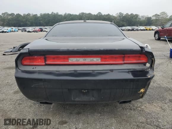 ✅ 2012 Dodge Challenger SXT • VIN: 2C3CDYAG1CH291592 • Lot: 86270304. Wystawiony na Copart z przebiegiem 231 594 mil. Bezpłatny archiwum sprzedaży aukcyjnych z USA i szczegółowy raport historii pojazdu na DreamBid. Zdjęcie 6.